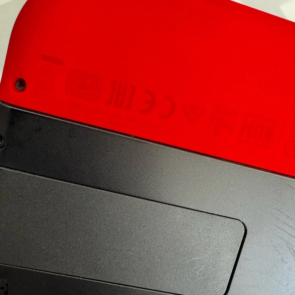 Nintendo Handheld Console - Black, Red, and Blue